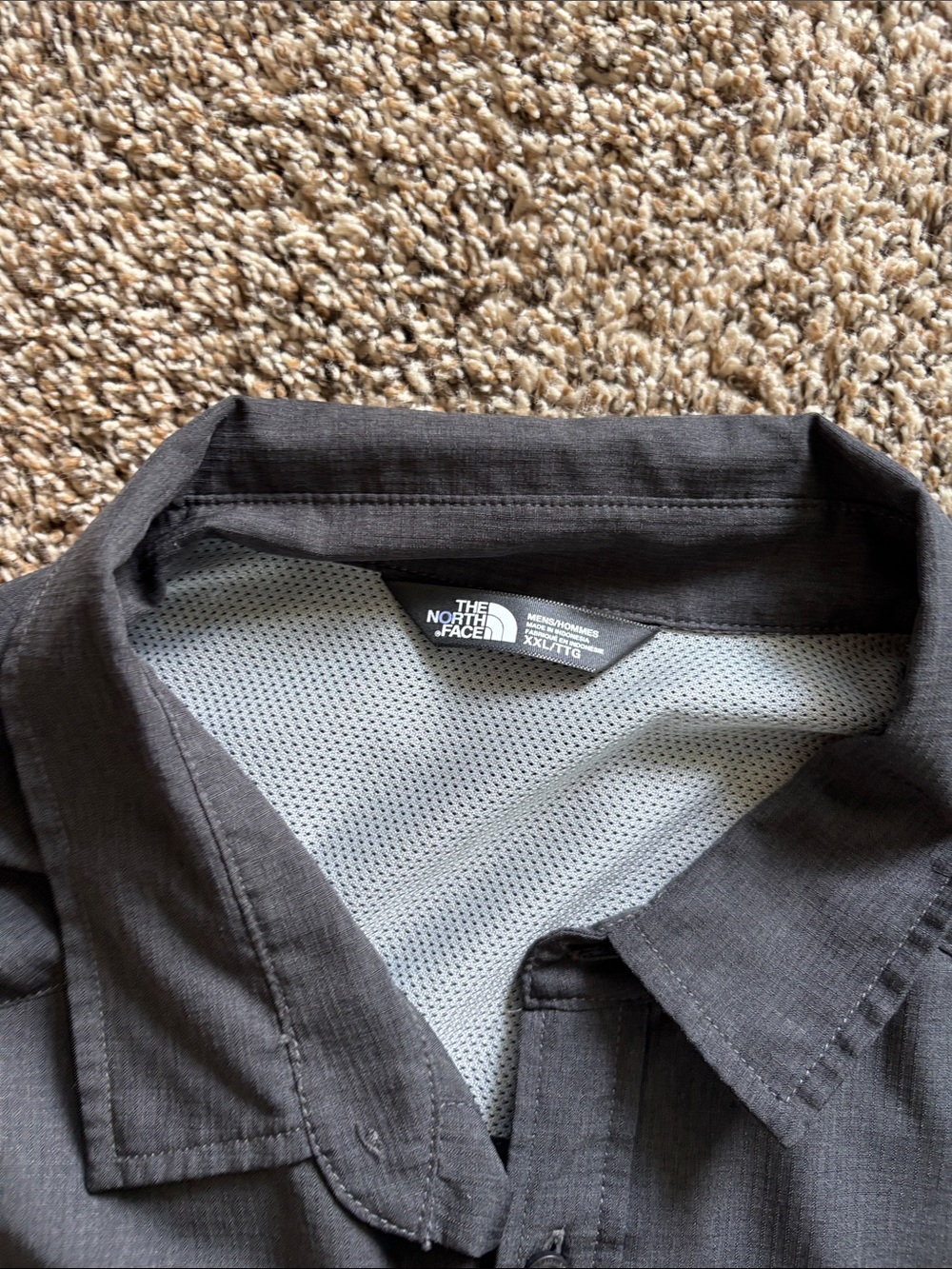 The North Face Men's Black Lightweight Shirt. Great for a casual summer evening.